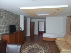 Telewizja i/lub zestaw kina domowego w obiekcie Willa Magnat
