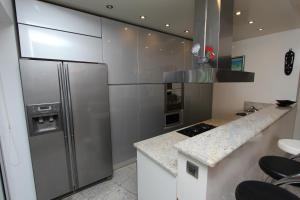Kuchyň nebo kuchyňský kout v ubytování Apartment Lycia