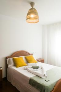 Postel nebo postele na pokoji v ubytování Apartamento Mercedes Quenxe Corcubión