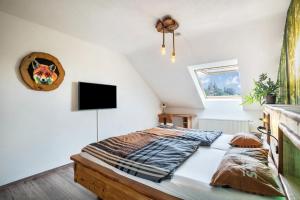 Rúm í herbergi á Im Rodeck Nest