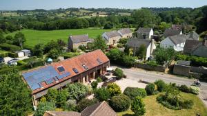 an aerial view of a house in a village at Dorset Holiday Barns in Sherborne