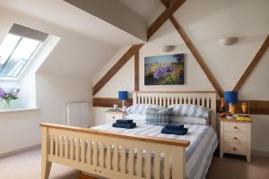 Postel nebo postele na pokoji v ubytování Dorset Holiday Barns