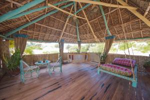 Balkón nebo terasa v ubytování Kizingo Beach Eco Lodge