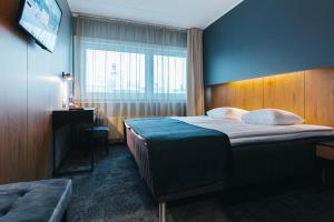 Postel nebo postele na pokoji v ubytování Go Hotel Shnelli + 37 fotografií