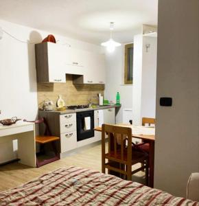 Küche/Küchenzeile in der Unterkunft Casina di Franca