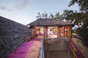 Zahrada ubytování Kizingo Beach Eco Lodge