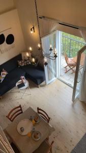 an aerial view of a living room with a table at Apartman Ezza in Lopud