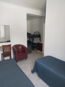 Rúm í herbergi á Hotel Klein Wien