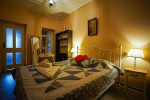 Letto o letti in una camera di Sighnaghi Art Hotel