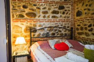 Letto o letti in una camera di Sighnaghi Art Hotel