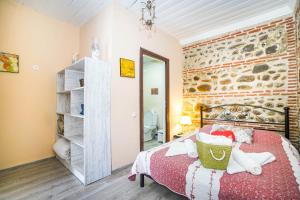 Letto o letti in una camera di Sighnaghi Art Hotel