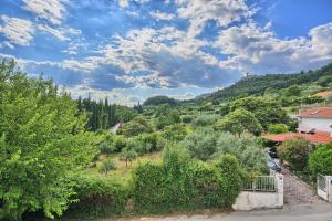 a view of a valley with trees and houses at A2- luxury apt w big balcony 4 min walk to beach in Split