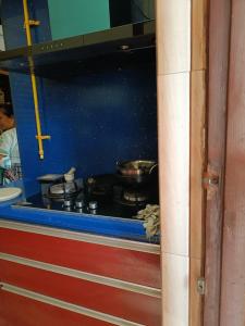 a group of pots and pans sitting on a stove at Heritage home in Cannaught Place in New Delhi