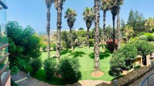Um jardim no exterior de Studio vue sur mer