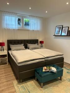 Postel nebo postele na pokoji v ubytování Premium Ferienwohnung im Herzen der Kurstadt