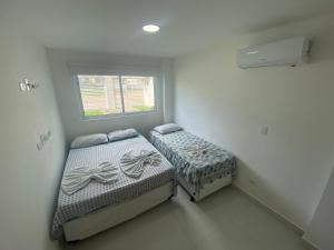 Katil atau katil-katil dalam bilik di SOLAR DE PORTO RICO "Aptms" P GALINHAS +44 gambar