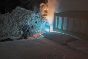 Postel nebo postele na pokoji v ubytování B&B Dimora Cigno