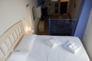 Postel nebo postele na pokoji v ubytování B&B Dimora Cigno