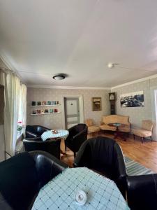Posezení v ubytování STF Korrö Gårdshotell - B&B