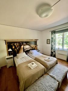 Postel nebo postele na pokoji v ubytování STF Korrö Gårdshotell - B&B
