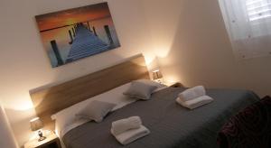 Posteľ alebo postele v izbe v ubytovaní Momentum Apartment