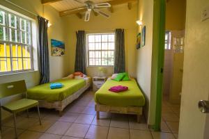 Ένα ή περισσότερα κρεβάτια σε δωμάτιο στο 26 Casa Chibi Chibi +11 φωτογραφίες