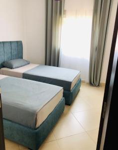 Postel nebo postele na pokoji v ubytování Appartement Charmant
