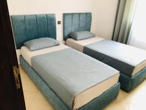 Postel nebo postele na pokoji v ubytování Appartement Charmant