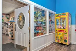 a room with a claw machine in a store at Sand Dunes 2740 in Myrtle Beach