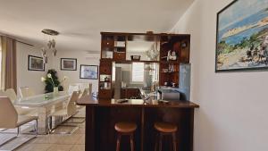 Ein Sitzbereich in der Unterkunft Apartment house Berry