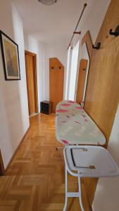 Ein Bett oder Betten in einem Zimmer der Unterkunft Apartment house Berry