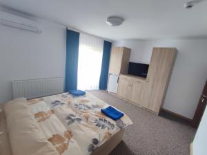 Postel nebo postele na pokoji v ubytování Casa Sturz