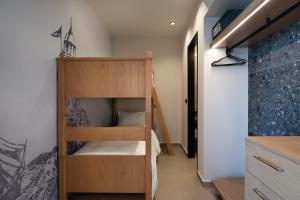 Ein Bett oder Betten in einem Zimmer der Unterkunft Prasonisi Light House Boutique Hotel