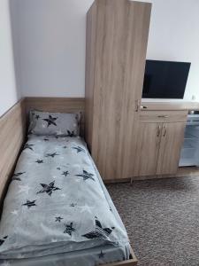Postel nebo postele na pokoji v ubytování Casa Sturz