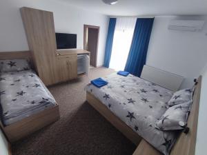 Postel nebo postele na pokoji v ubytování Casa Sturz