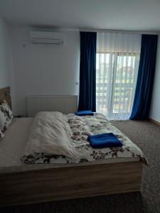 Postel nebo postele na pokoji v ubytování Casa Sturz
