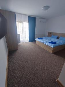 Postel nebo postele na pokoji v ubytování Casa Sturz