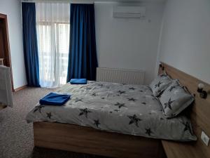 Postel nebo postele na pokoji v ubytování Casa Sturz