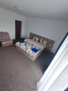 Postel nebo postele na pokoji v ubytování Casa Sturz