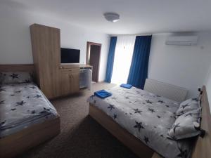 Postel nebo postele na pokoji v ubytování Casa Sturz