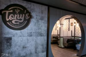 a salon with a sign on the wall of a room at Sternwheeler Hotel & Conference Centre, Trademark by Wyndham in Whitehorse