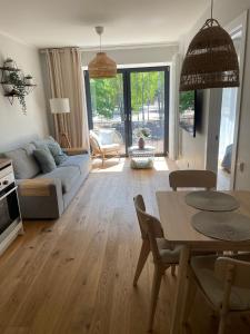 A seating area at Albatross Beach Apartment - SPA, Sea and Forest