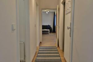 Postel nebo postele na pokoji v ubytování Terrassenhaus, FeWo 58