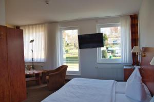 TV a/nebo společenská místnost v ubytování Hotel Quellenhof