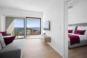 Ένα ή περισσότερα κρεβάτια σε δωμάτιο στο Adriatic Garden Apartments +68 φωτογραφίες