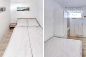 Ένα ή περισσότερα κρεβάτια σε δωμάτιο στο Terrassenhaus, FeWo 73