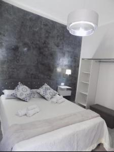 Llit o llits en una habitació de Casa Sanabria