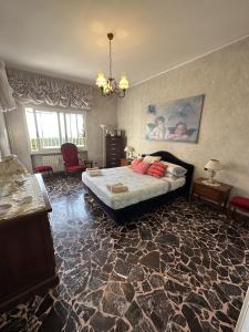 Postel nebo postele na pokoji v ubytování LE ROSE DI EMMA