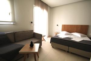 Postel nebo postele na pokoji v ubytování Mirabello Hotel