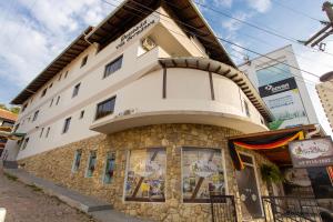 a building with a stone facade at Espaço Herlang in Blumenau